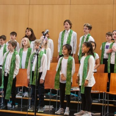 A children's choir sings during the worship service.